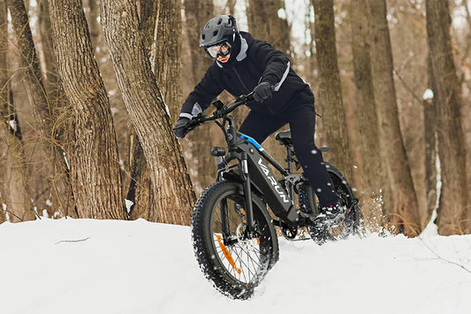 VARUN electric bike riding near lake and mountain road